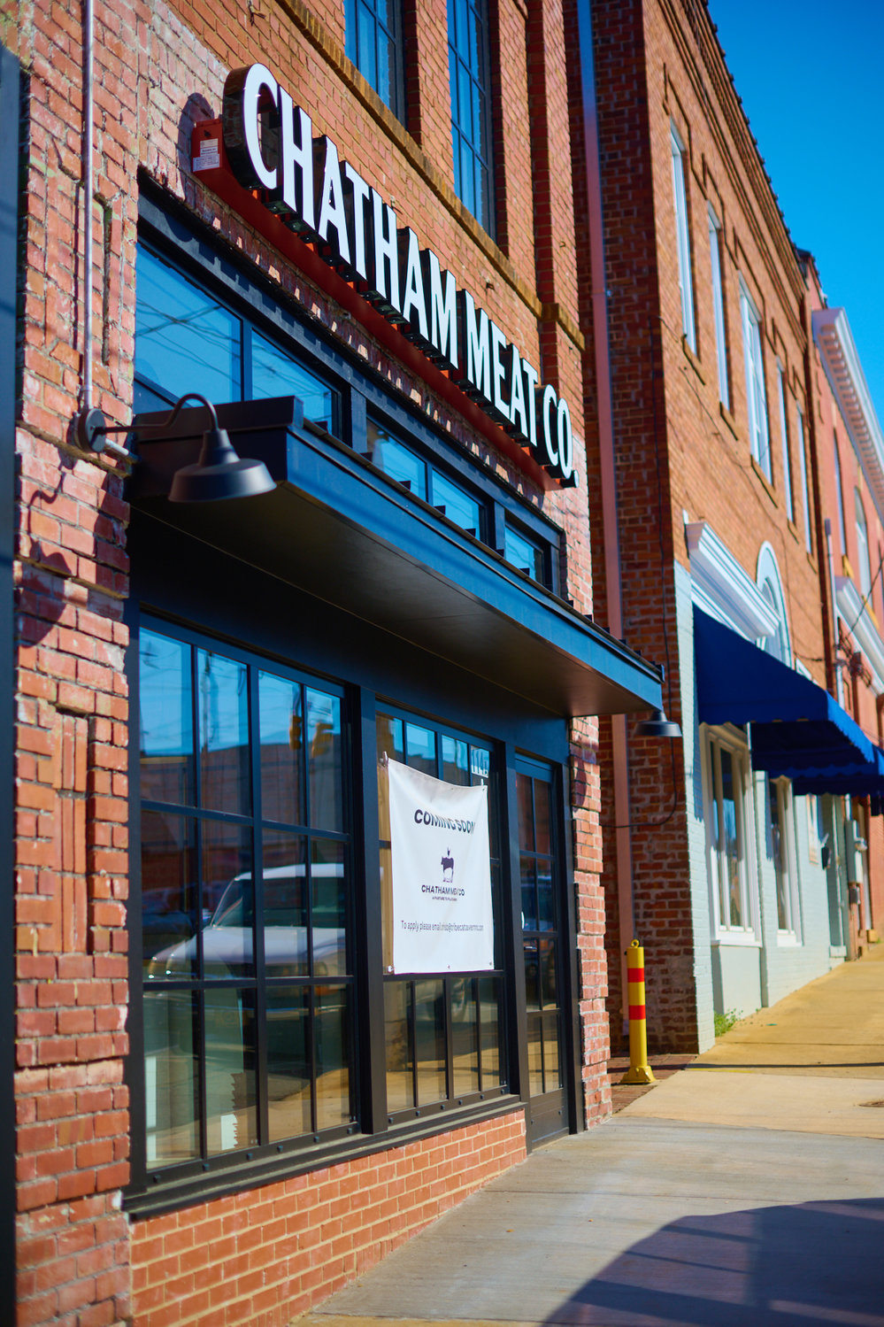 The storefront of the new Chatham Meat Company in downtown Siler City is part of a multi-million dollar revitalization project from Wren Industries.